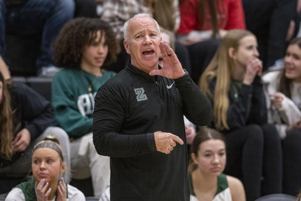 Zionsville High School head coach Andy Maguire reacts to action on the court during the first half of an IHSAA Girls Sectional semi-final basketball game against Hamilton Southeastern High School, Friday, Feb. 3, 2023, at Noblesville High School.