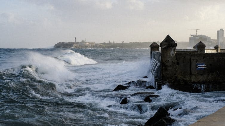 <span class="caption">Havana’s Malecón esplanade at sunrise.</span> <span class="attribution"><span class="source">James Clifford Kent</span>, <span class="license">Author provided</span></span>