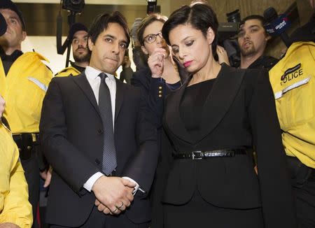 Canadian celebrity radio host Jian Ghomeshi leaves court with his lawyer Marie Henein (R) after getting bail on multiple counts of sexual assault in Toronto November 26, 2014. REUTERS/Peter Power