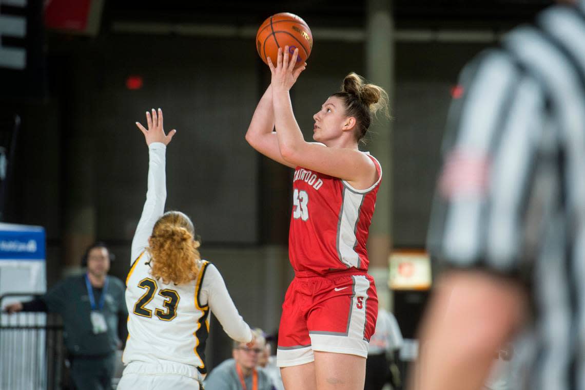 Stanwood forward Vivienne Berrett (53) puts up a shot in the fourth quarter against Lincoln in the fourth-sixth place game of the Class 3A girls state basketball tournament on Saturday, March 4, 2023 at the Tacoma Dome in Tacoma, Wash.