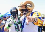 <p>Fans Brad Carter, aka “Cannonball” (L) poses with Karl Sides, aka “The Ram Man” (R) while tailgating before the start of the Los Angeles Rams home opening game against the Seattle Seahawks at Los Angeles Coliseum on September 18, 2016 in Los Angeles, California. (Photo by Harry How/Getty Images) </p>