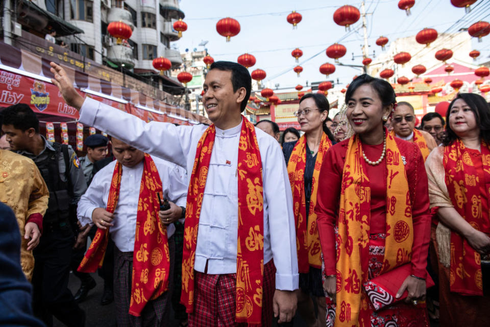 Yangon Regional Chief Minister U Phyo Min Thein waves to the public during a ceremony to mark the first day of the Lunar New Year in Yangon's Chinatown on January 25, 2020.    Chinese New Year, also known as Lunar New Year or Spring Festival is most important festival for Chinese people.       (Photo by Shwe Paw Mya Tin/NurPhoto)