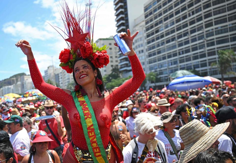 Lula supporters celebrate his victory in Copacabana on Sunday (AFP via Getty Images)