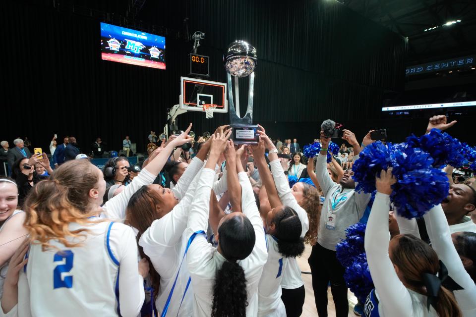 Mar 11, 2023; Frisco, TX, USA; The Middle Tennessee Blue Raiders celebrate punching their ticket to the NCAA Tournament after defeating the Western Kentucky Lady Toppers in the Conference USA Tournament Championship at Ford Center at The Star. Mandatory Credit: Chris Jones-USA TODAY Sports