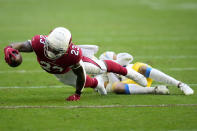 Arizona Cardinals running back Corey Clement (23) lunges for a first down against the Los Angeles Chargers during the second half of an NFL football game, Sunday, Nov. 27, 2022, in Glendale, Ariz. (AP Photo/Ross D. Franklin)