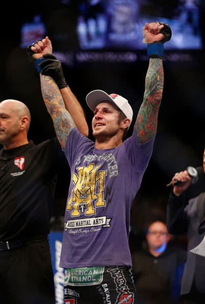 Eddie Wineland reacts to being declared the victor over Brad Pickett after their bantamweight fight at UFC 155 on December 29, 2012 at MGM Grand Garden Arena in Las Vegas, Nevada. (Photo by Josh Hedges/Zuffa LLC/Zuffa LLC via Getty Images)