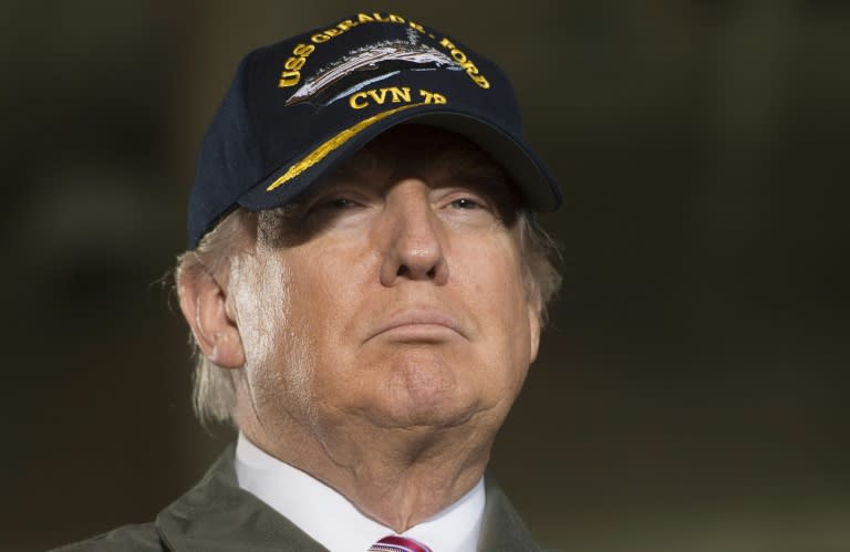 US President Donald Trump speaks aboard the USS Gerald R. Ford aircraft carrier in Newport News, Virginia, on March 2, 2017