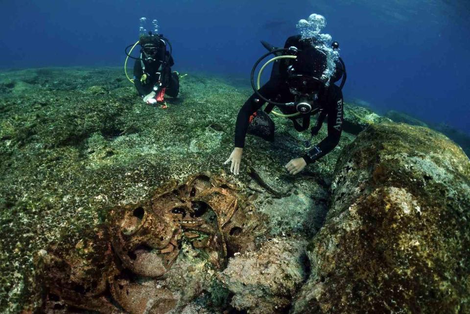 <p>Hellenic Ministry of Culture</p> Researchers examine wreckage found near Kasos in Greece