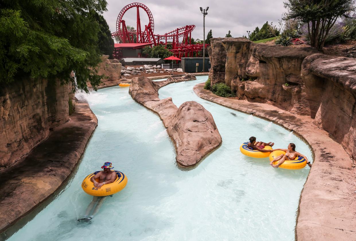 A couple float down Adventure River at the Hurricane Bay water park at Kentucky Kingdom Monday on opening day in 2020.