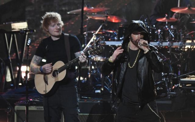 Ed Sheeran performing with Eminem on stage at the 37th Annual Rock and Roll Hall of Fame Induction Ceremony in 2022 (AFP via Getty Images)