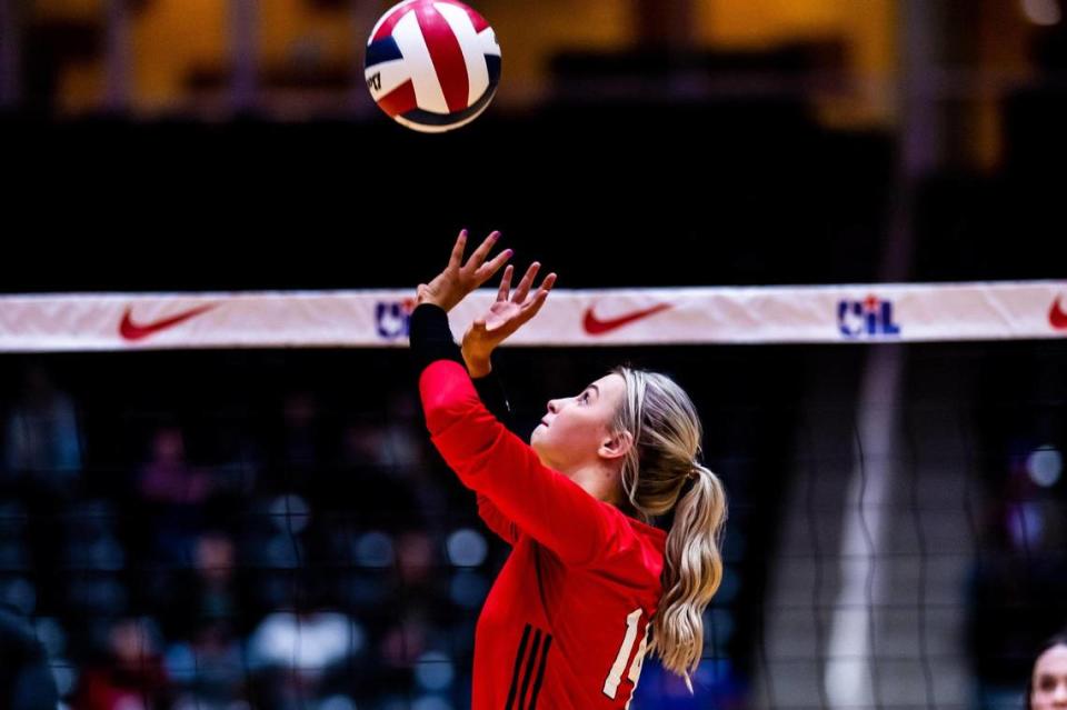 Morgan Howard sets during the 5A state semifinal between Colleyville Heritage and Montgomery Lake Creek at the Curtis Culwell Center in Garland on November 18th, 2022.