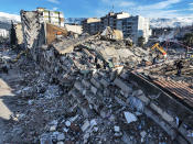 Aerial photo shows the destruction in Kahramanmaras, southern Turkey, Wednesday, Feb. 8, 2023. Thinly stretched rescue teams worked through the night in Turkey and Syria, pulling more bodies from the rubble of thousands of buildings toppled by a catastrophic earthquake. The death toll rose Wednesday to more than 9,500, making the quake the deadliest in more than a decade. (Ahmet Akpolat/DIA via AP )