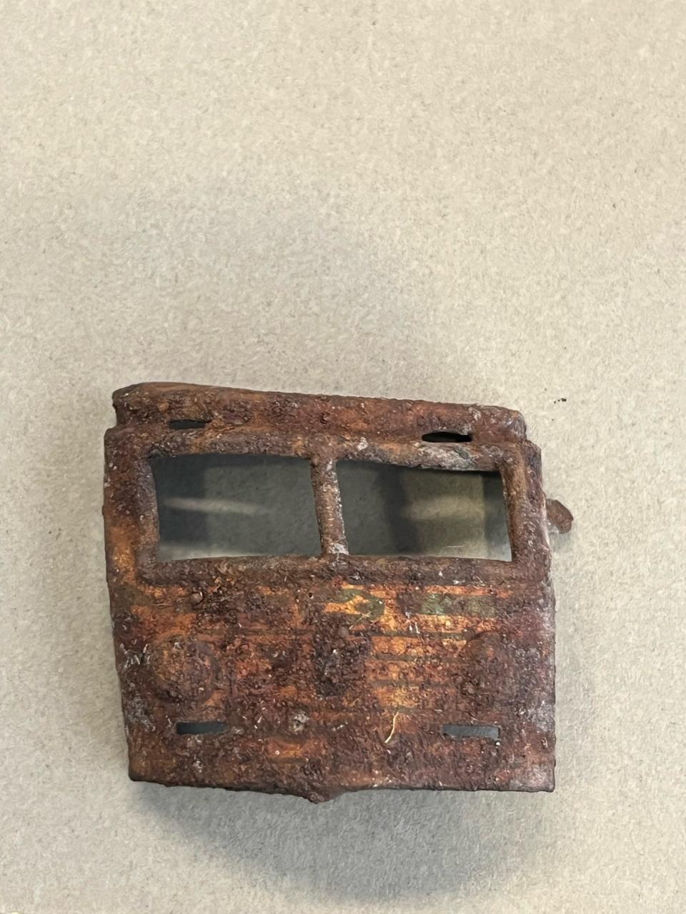 Part of a toy bus found in the remnants of an old structure on a hillside near CSU Channel Islands.