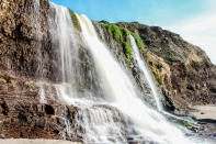 <p>Alamere Falls in at Point Reyes National Seashore in Bolinas, Calif. This is one of few waterfalls that drops off directly into the Pacific Ocean. (Photo: Eddie Hernandez Photography/iStockphoto/Getty Images) </p>