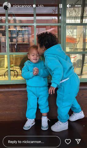 <p>Nick Cannon/Instagram</p> Legendary Love gets a kiss from one of his big brothers