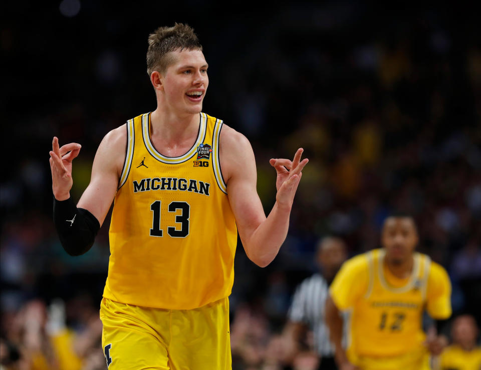 Michigan’s Moritz Wagner (13) reacts after scoring a 3-point shot against Loyola-Chicago during the second half in the semifinals of the Final Four NCAA college basketball tournament, Saturday, March 31, 2018, in San Antonio. (AP Photo/Charlie Neibergall)