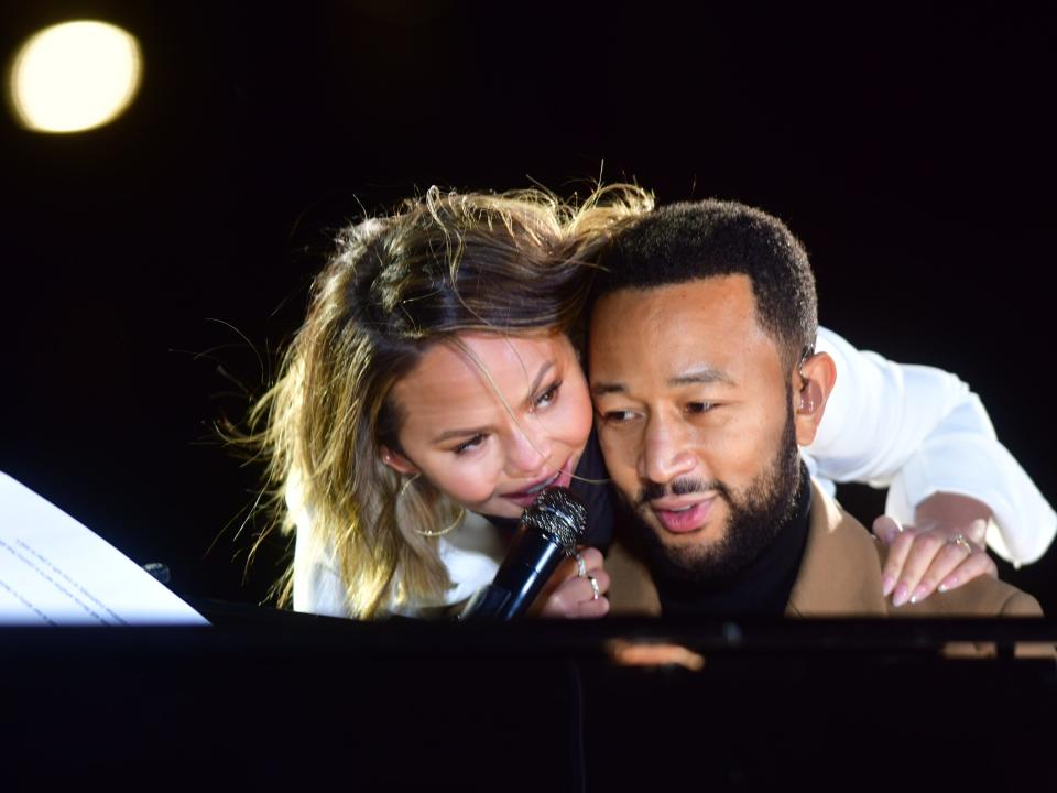 Chrissy Teigen and John Legend before Democratic vice presidential nominee Kamala Harris spoke at a drive-in election eve rally on November 2, 2020 in Philadelphia, Pennsylvania