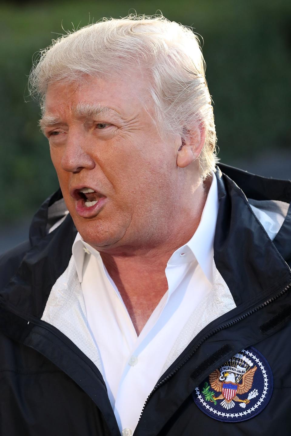 Donald Trump is pictured before boarding Marine One to depart from the White House on 3 October. (Mark Wilson/Getty Images)