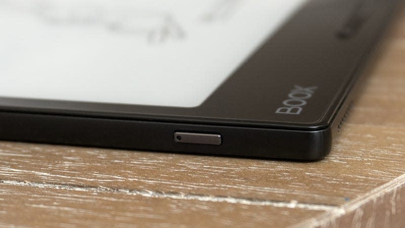 A close-up of the Onyx Boox Leaf 2's power button on its top edge.