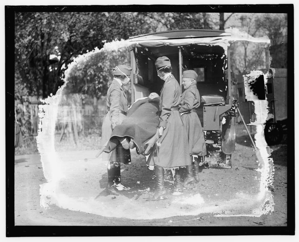 This Library of Congress photo shows a demonstration at the Red Cross Emergency Ambulance Station in Washington, D.C., during the influenza pandemic of 1918. Science has ticked off some major accomplishments over the last century. The world learned about viruses, cured various diseases, made effective vaccines, developed instant communications and created elaborate public-health networks. Yet in many ways, 2020 is looking like 1918, the year the great influenza pandemic raged. (Library of Congress Prints and Photographs Division via AP)