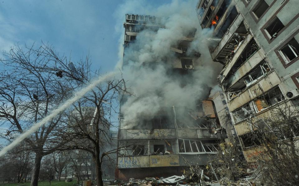 A view shows a residential building damaged by a Russian missile strike, amid Russia's attack on Ukraine, in Zaporizhzhia - STRINGER/REUTERS