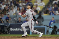 Arizona Diamondbacks' Alek Thomas watches his home run during the seventh inning in Game 1 of a baseball NL Division Series against the Los Angeles Dodgers, Saturday, Oct. 7, 2023, in Los Angeles. (AP Photo/Ashley Landis)