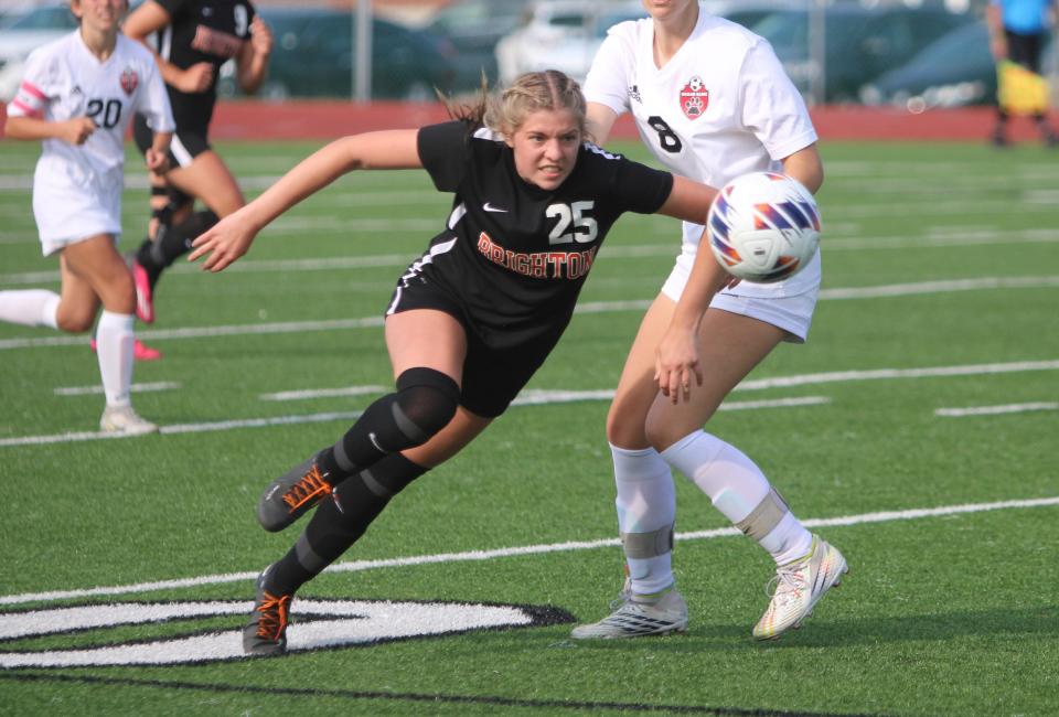 Brighton's Brynn Bobby (25) pursues the ball during a regional semifinal soccer game against Grand Blanc Tuesday, June 6, 2023 in Northville.