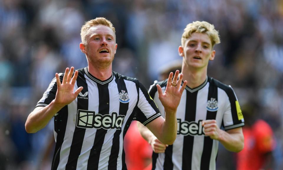 <span>Sean Longstaff (left) celebrates scoring Newcastle’s equaliser against Brighton, as Anthony Gordon comes to congratulate him.</span><span>Photograph: Harriet Massey/Newcastle United/Getty Images</span>