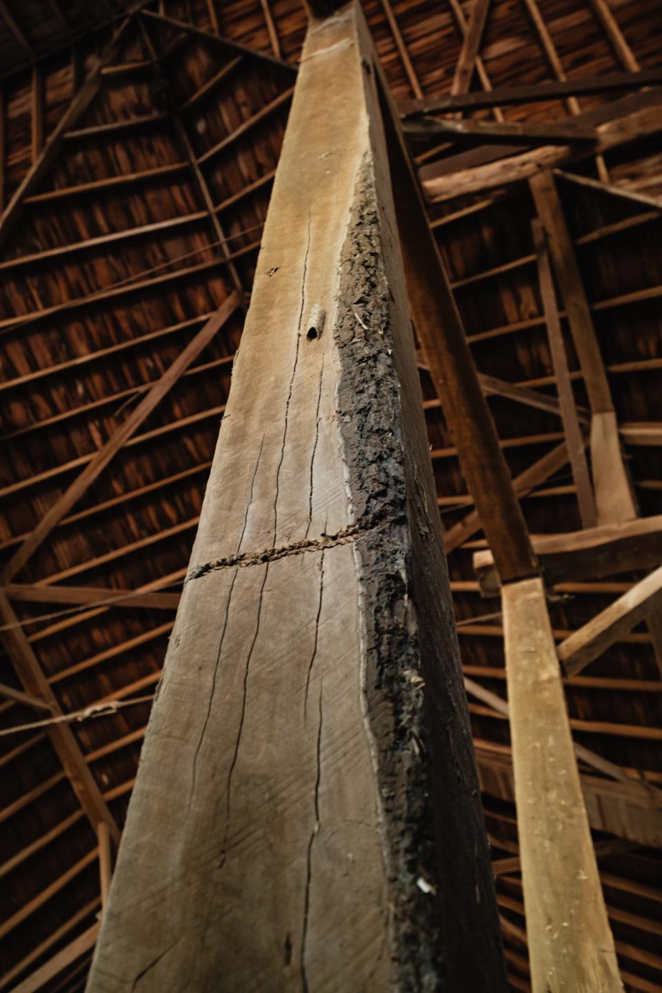 A beam can be seen in the Steam Valley Farms 1913 barn during an annual barn tour held by the Friends of Ohio Barns, Friday, April 26 in Dover Township. The group tours barns every year in a different county.