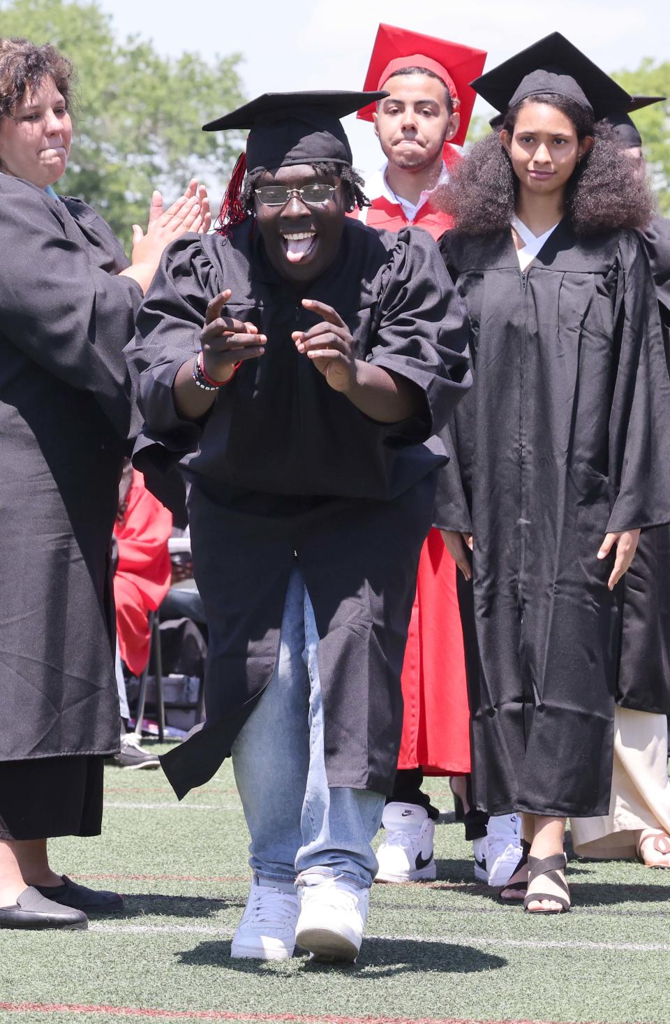 Brockton High School's Shawn Lerby receives his diploma during the 156th graduation exercises on Saturday, June 4, 2022.