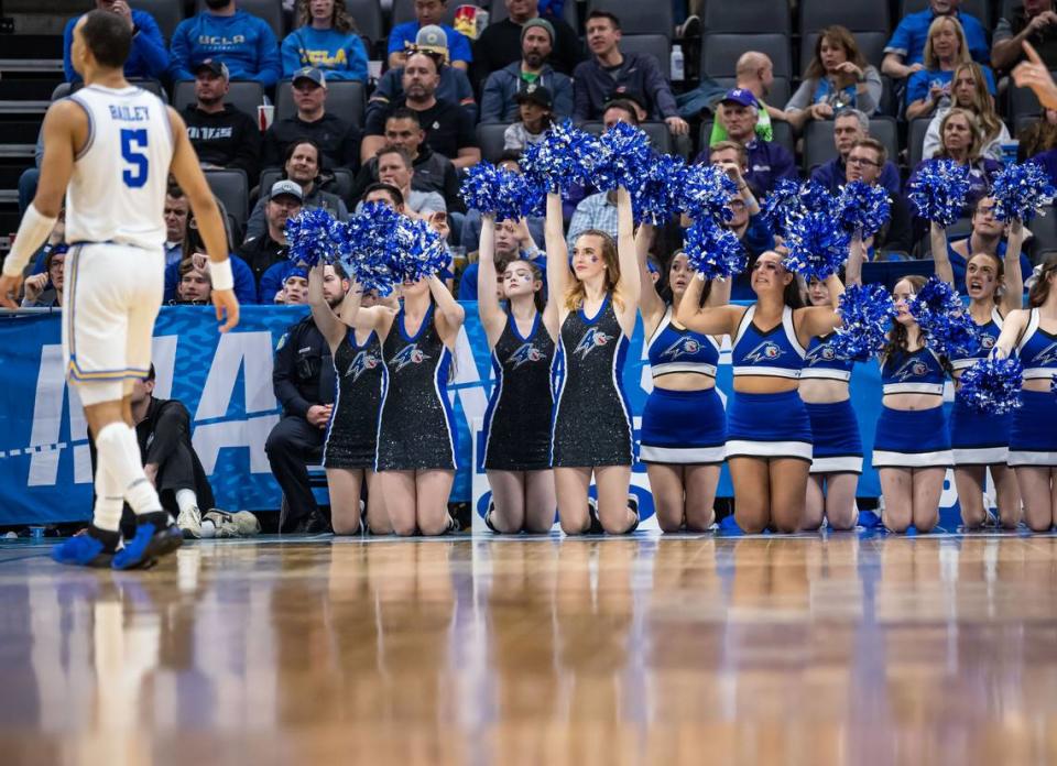 UNC Asheville Bulldogs cheerleader cheer for their team against the UCLA Bruins in the second half of the NCAA Tournament game at Golden 1 Center on Thursday.