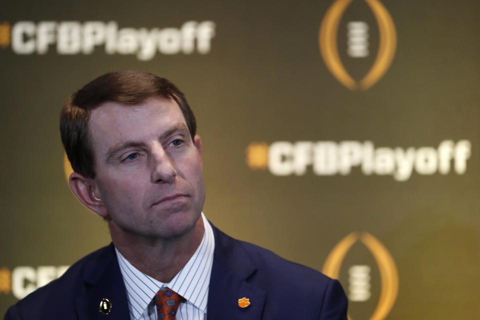 Clemson head coach Dabo Swinney speaks during a news conference ahead for the College Football playoffs Thursday, Dec. 12, 2019, in Atlanta. Ryan Day of Ohio State was unable to attend. (AP Photo/John Bazemore)