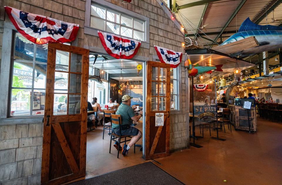 The Milwaukee Public Market is decorated with decorative half-roundel U.S. flags as the 2024 Republican National Convention commences on Monday July 15, 2024 in Milwaukee, Wis.