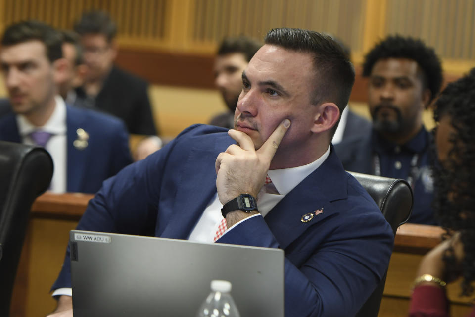 Deputy District Attorney Will Wooten listen to the judge during a hearing on charges against former President Donald Trump in the Georgia election interference case on Thursday, March 28, 2024 in Atlanta. Lawyers for Trump argued in a court filing that the charges against him in the Georgia election interference case seek to criminalize political speech and advocacy conduct that is protected by the First Amendment. (Dennis Byron/Hip Hop Enquirer via AP)