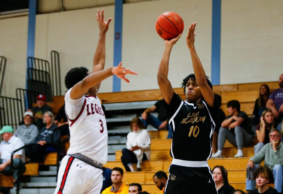 BJ Davis-Ray, of Link Academy, shoots a field goal during a game against the Legacy (Texas) Broncos in the Ozark Mountain Shootout at Glendale High School on Thursday, Dec. 8, 2022.