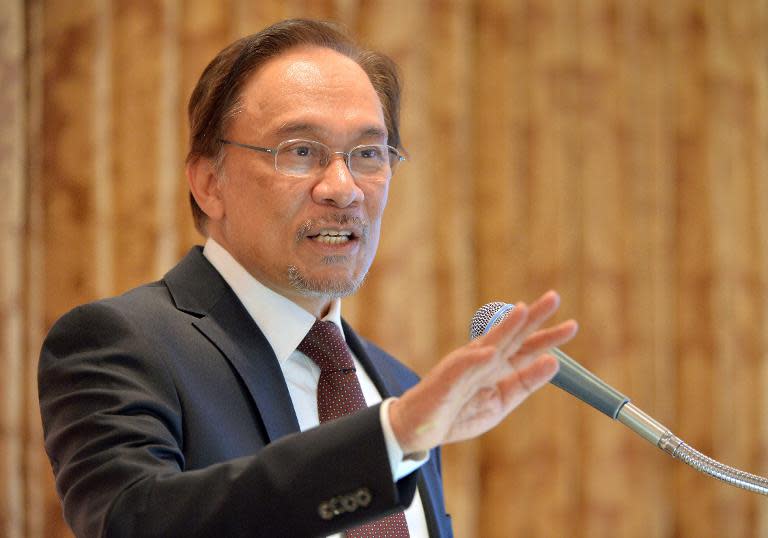 Malaysia's opposition leader Anwar Ibrahim delivers a speech in Tokyo on February 27, 2014