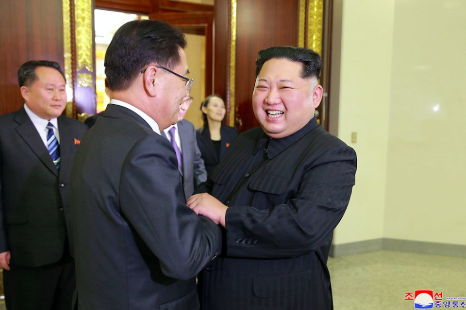 <em>North Korean pictures show a beaming Kim during the meeting (AP)</em>