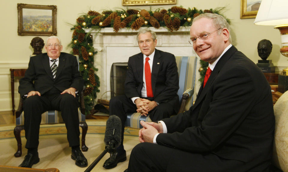 FILE - This is a Friday, Dec. 7, 2007 file photo of President Bush, center, as he meets with Ian Paisley, Ireland's first minister, left, and Martin McGuinness, Ireland's first deputy minister, in the Oval Office of the White House in Washington. McGuinness, an IRA and Sinn Fein leader who became a minister of peacetime Northern Ireland, has died, according to UK media Tuesday, March 21, 2017. (AP Photo/Charles Dharapak, File)