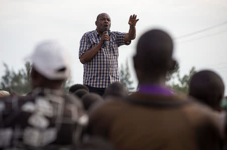 Kisumu county Governor Jack Ranguma speaks to a crowd during an election campaign in the village of Miwani in Kisumu county Kenya April 19, 2017. REUTERS/Baz Ratner