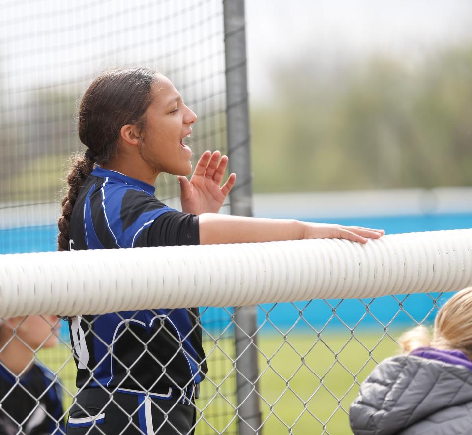 Centerville sophomore Harmony Owens hollers out to a teammate from the dugout during a game against Cowan April 30, 2022.