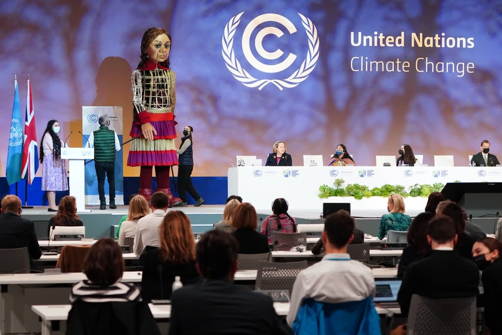 Puppet Little Amal visits the Cop26 summit (Jane Barlow/PA) (PA Wire)