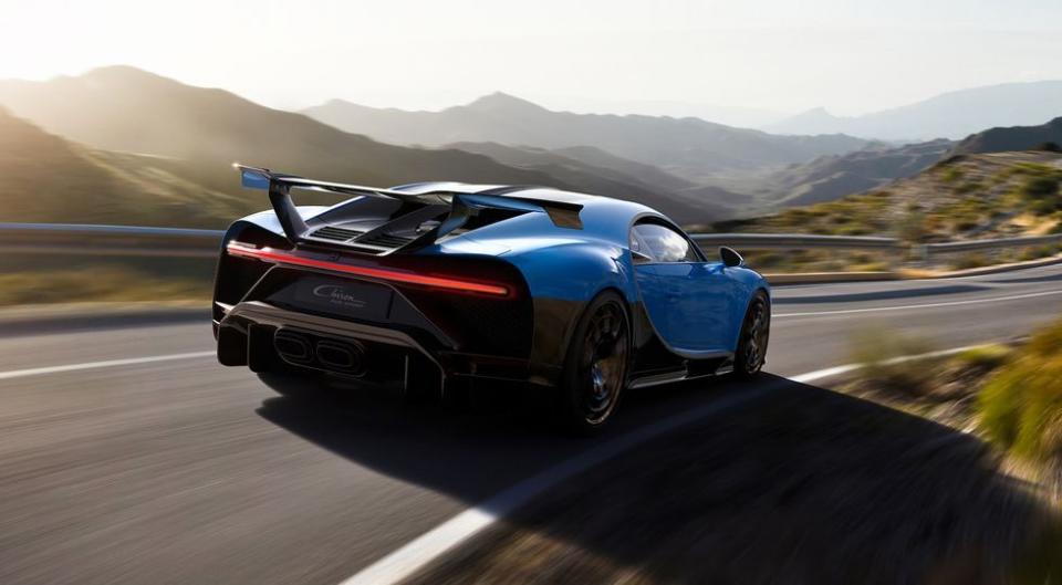 <p>The normal Bugatti Chiron has a movable wing that retracts into the body when it's not in use. That whole system is thrown out the window for the sake of weight in <a href="https://www.roadandtrack.com/new-cars/a31208387/2021-chiron-pur-sport-pictures-specs-hp-info/" rel="nofollow noopener" target="_blank" data-ylk="slk:the Pur Sport;elm:context_link;itc:0;sec:content-canvas" class="link ">the Pur Sport</a>. In its place sits a massive fixed item that reaches to the end of either side of the car. </p>