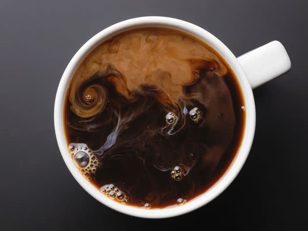 Coffee and work go hand in hand. But which time of day is best? (Photo: Jonathan Knowles via Getty Images)