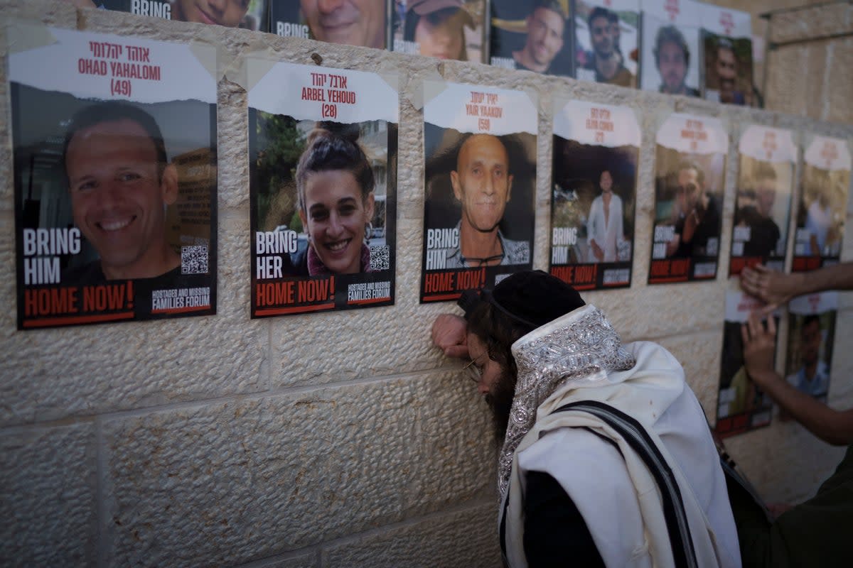 People attend a mass public prayer calling for the hostages held in the Gaza Strip to be released (Copyright 2024 The Associated Press. All rights reserved.)