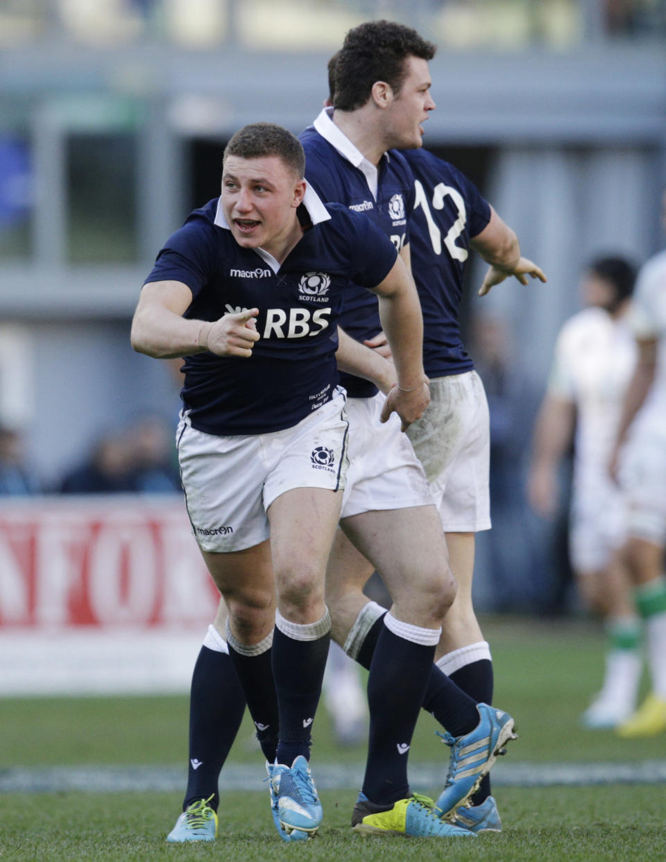 Scotland's Duncan Weir celebrates after he scored the match winning point during a Six Nations rugby union international match between Italy and Scotland, in Rome, Saturday, Feb. 22, 2014. Scotland won 21-20. (AP Photo/Andrew Medichini)