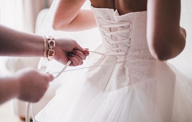 After everything they'd done, this bride wanted her bridesmaids to help pay for her dress too. Photo: Getty