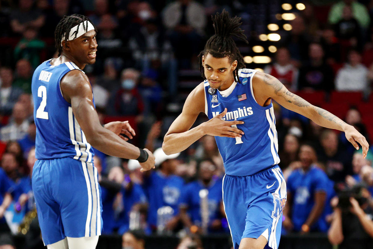 PORTLAND, OREGON - MARCH 17: Emoni Bates #1 of the Memphis Tigers reacts after making a basket during the first half against the Boise State Broncos in the first round game of the 2022 NCAA Men's Basketball Tournament at Moda Center on March 17, 2022 in Portland, Oregon. (Photo by Ezra Shaw/Getty Images)