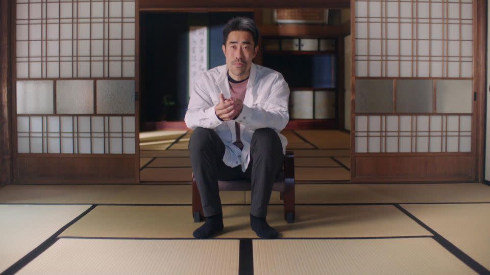 Tomoaki Hamatsu, a.k.a. Nasubi, reminisces about his time on the game show "Denpa Shonen" in the Hulu documentary “The Contestant.” - Disney