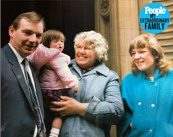 <p>Courtesy of Robert Isdale</p> Robert and Margaret Isdale and their daughter Fiona on the day they formally adopted Kim