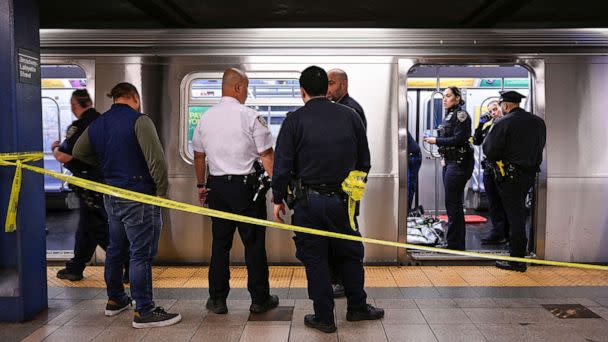 PHOTO: New York police officers respond to the scene where a fight was reported on a subway train, May 1, 2023, in New York. (Paul Martinka/AP)